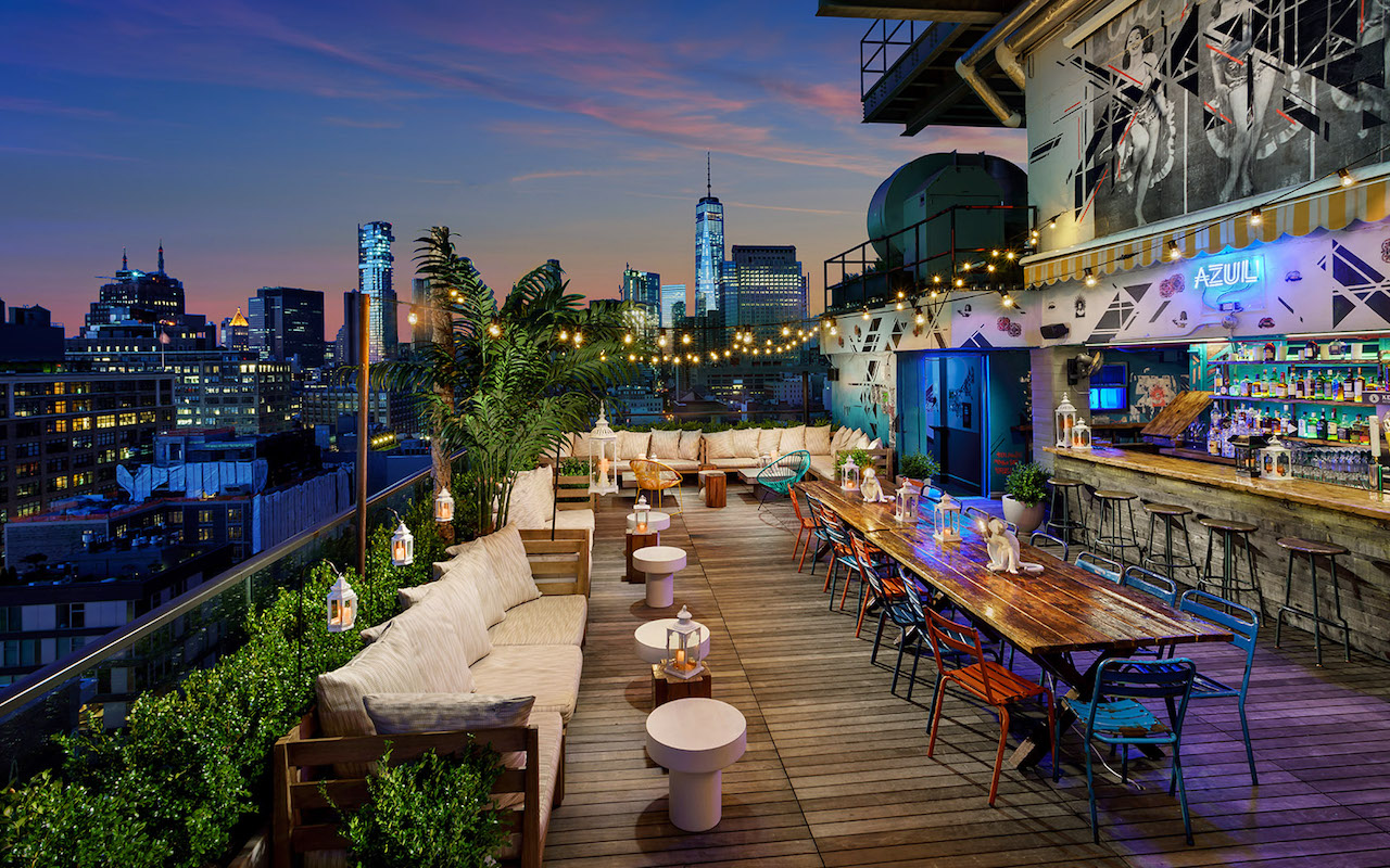 New York City is full of rooftop bars full of tourists during the summer mo...