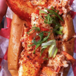 butter poached lobster roll with scallions